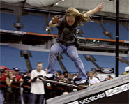 Picture of skateboarder grinding a ledge.