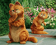 Garfield comes paw-to-paw with his look-a-like, Prince, in Garfield: A Tail of Two Kitties.