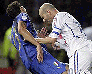 Zinedine Zidane retired with a butt, er, a bang.
