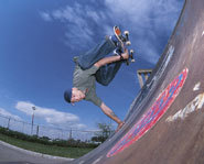 A skateboarder doing a trick.
