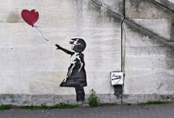 British graffiti artist Banksy has sold some of his works for more than $500,000.