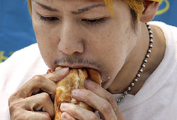 Six-time world champion hot dog eater, Takeru Kobayashi, was defeated in 2007. Who will win this year's contest?