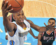 Chauncey Billups Drives the Denver Nuggets